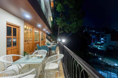 Patio, Night, View (from property/room), Balcony/Terrace, Living room, Seating area, Dining area, Pool view, Swimming pool