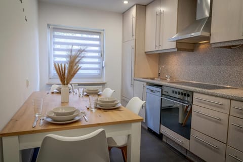 Dining area, stove, kitchen