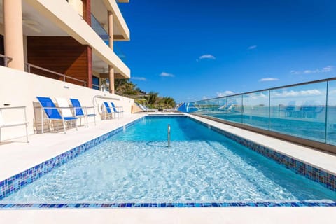 SeaDreams 5 - Luxury Condo with Shared Pool, Hot Tub, Rooftop Lounge Apartment in West Bay