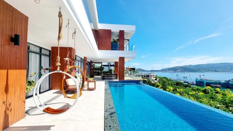 Property building, Patio, Nearby landmark, Day, Natural landscape, View (from property/room), Balcony/Terrace, Lake view, Mountain view, Pool view, River view, Sea view, Swimming pool, sunbed