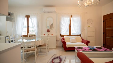 Living room, Dining area, towels, wardrobe, air conditioner