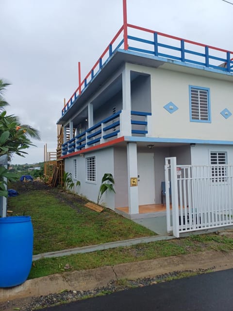 Rooster Run Guest House and Camping offers a unique rooftop and off the ground camping experience along with interior air-conditioned rooms, Enjoy Carribean Breezes, Ocean Views, Stay and Play, convenient location Luxury tent in Puerto Diablo