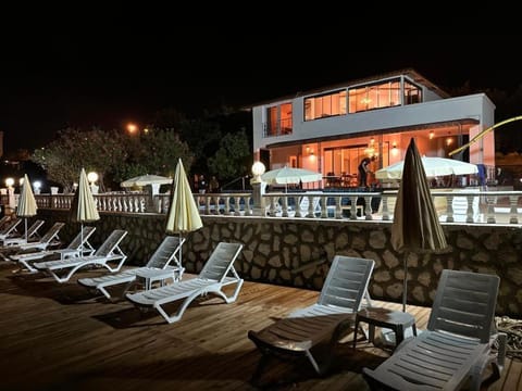 Patio, Night, Pool view, Swimming pool, sunbed