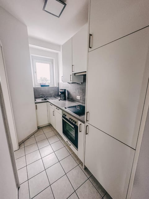 Kitchen or kitchenette, stove, kitchen