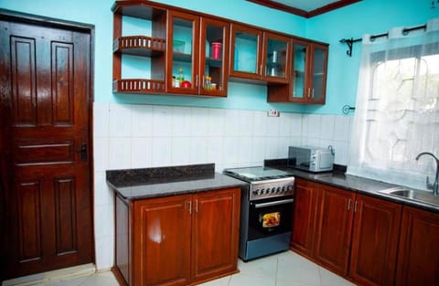 Kitchen or kitchenette, dishwasher, stove