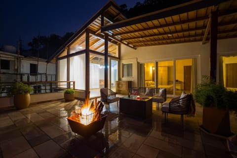 Property building, Patio, Night, View (from property/room), Balcony/Terrace, Living room, Seating area