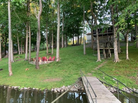 Property building, Natural landscape, Seating area, Lake view, fireplace