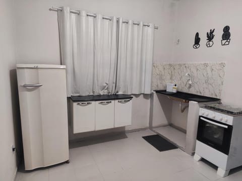 Kitchen or kitchenette, oven, stove