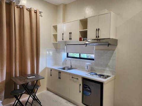 Kitchen or kitchenette, stove