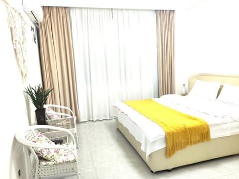 Bed, Seating area, Bedroom