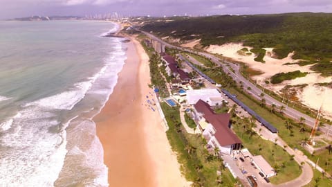 Property building, Nearby landmark, Property logo or sign, Natural landscape, Bird's eye view, Beach, City view, Sea view