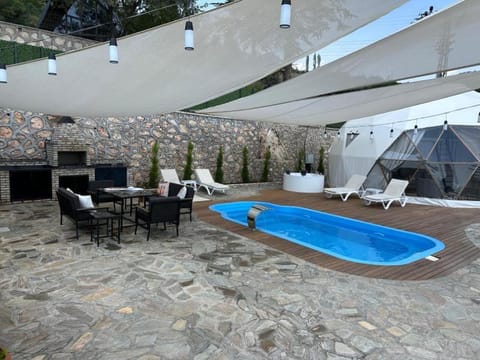 Patio, Day, Natural landscape, Hot Tub, Seating area, Pool view, Swimming pool, Swimming pool, sunbed