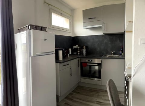 Kitchen or kitchenette, oven, stove