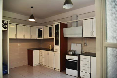 Kitchen or kitchenette, oven, stove