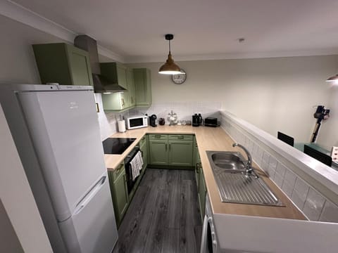 Kitchen or kitchenette, oven, stove, toaster