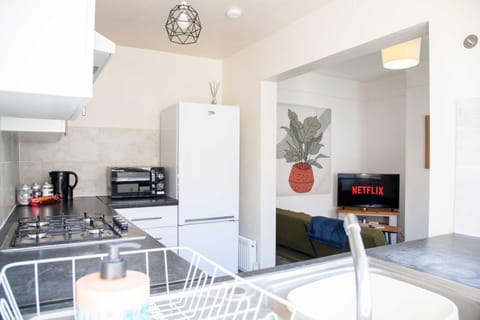 Kitchen or kitchenette, Living room, Seating area, oven, stove, toaster