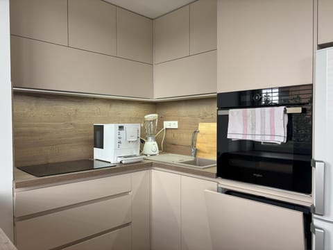 Kitchen or kitchenette, oven