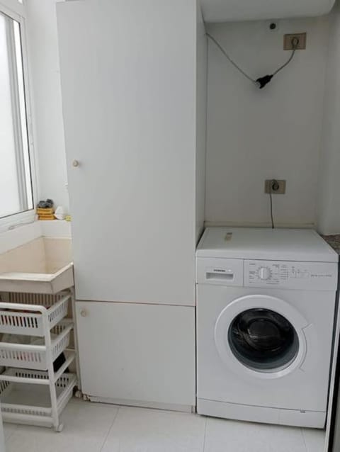 Inner courtyard view, washing machine