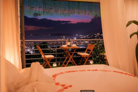 Bed, Night, View (from property/room), Balcony/Terrace, Bedroom, City view, Mountain view, Sea view