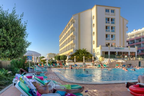 Property building, Day, Pool view, Swimming pool, sunbed