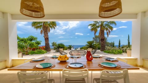 Patio, Natural landscape, View (from property/room), Seating area, Dining area, Sea view