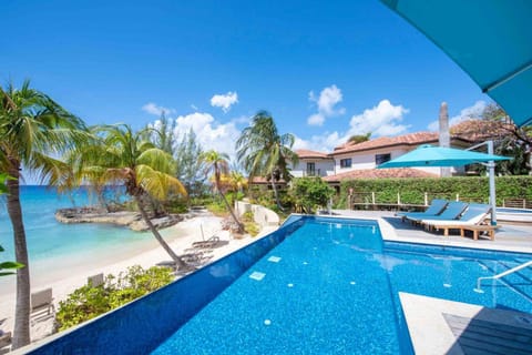 Property building, Day, Pool view, Sea view, Swimming pool, sunbed