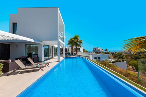 Property building, Day, Natural landscape, Pool view, Swimming pool, sunbed