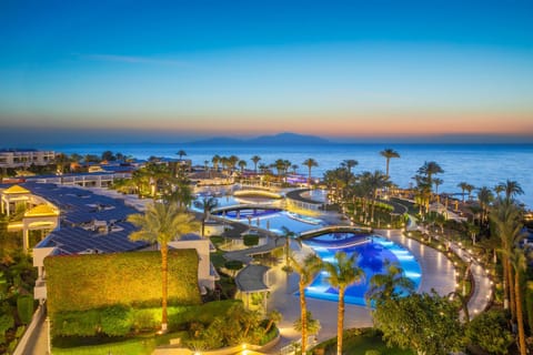 Property building, Night, Natural landscape, Bird's eye view, Sea view, Swimming pool