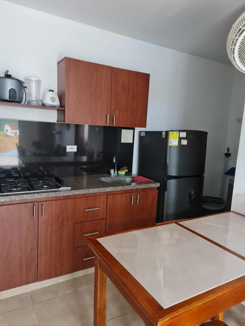 Kitchen or kitchenette, dishwasher, stove