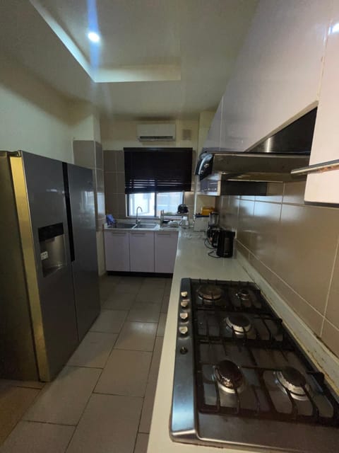 Kitchen or kitchenette, oven, stove