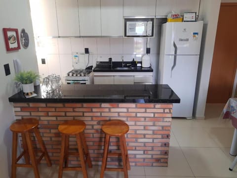 Kitchen or kitchenette, microwave, minibar, stove