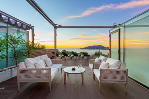 Patio, View (from property/room), Seating area, Mountain view, Sea view