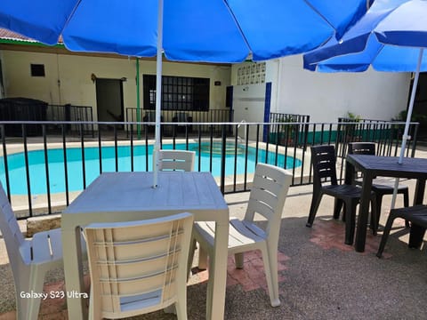 Patio, Day, Dining area, Pool view, Swimming pool, sunbed