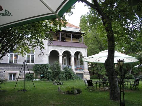 Property building, Patio, Garden, Seating area