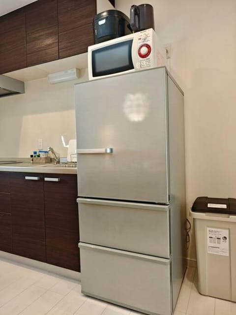 Kitchen or kitchenette, microwave