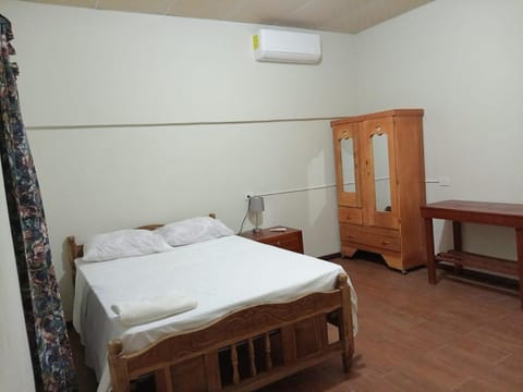 Bed, wardrobe, air conditioner