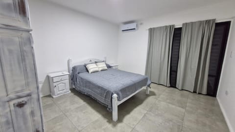 Photo of the whole room, Bedroom, air conditioner