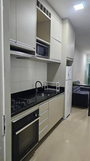 Kitchen or kitchenette, oven, stove, kitchen