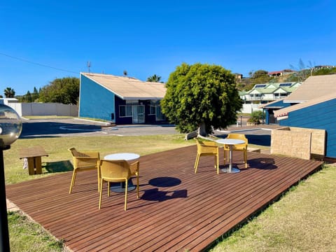 Property building, Patio, Natural landscape, Seating area