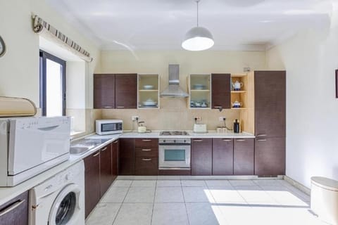 Kitchen or kitchenette, dishwasher, internet, oven, stove, toaster, washing machine