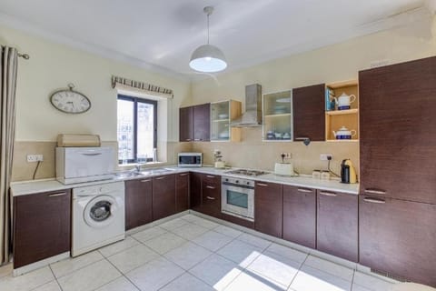 Kitchen or kitchenette, dishwasher, internet, oven, stove, washing machine