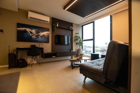 TV and multimedia, Living room, Seating area, air conditioner