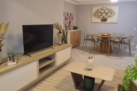 Apartamento com Localização Central em Condomínio com Piscina Aquecida na Riviera Apartment in Bertioga