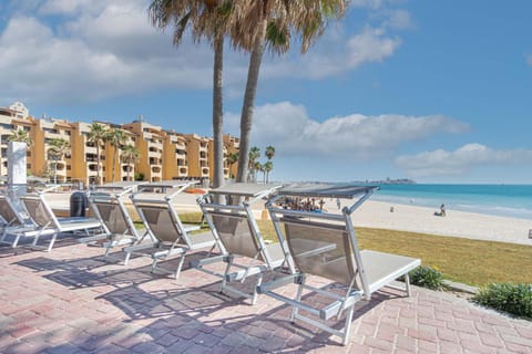 Property building, Beach, Sea view, sunbed