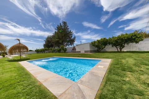 Property building, Living room, Swimming pool