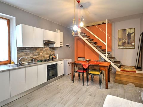 Kitchen or kitchenette, Living room, Seating area, Dining area, stove