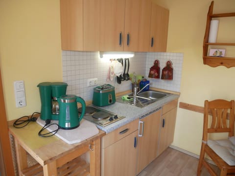 Kitchen or kitchenette, stove, toaster