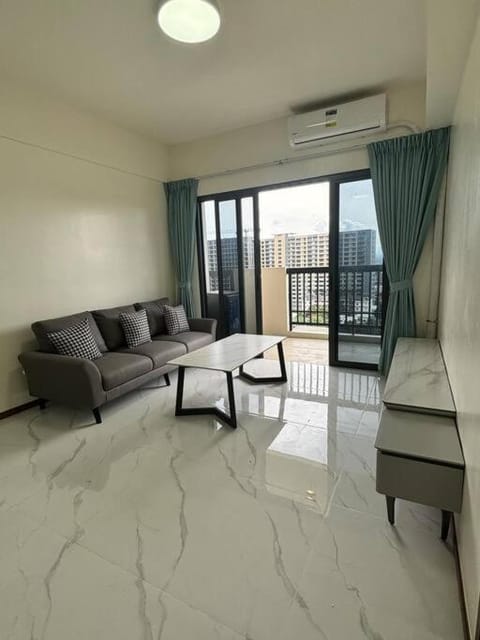 View (from property/room), Balcony/Terrace, Living room, Seating area, air conditioner