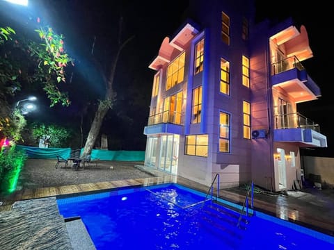 Property building, Night, Pool view, Swimming pool