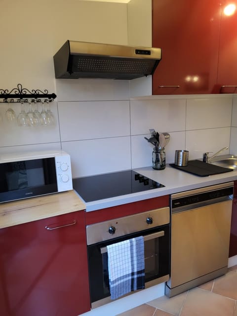 Kitchen or kitchenette, stove